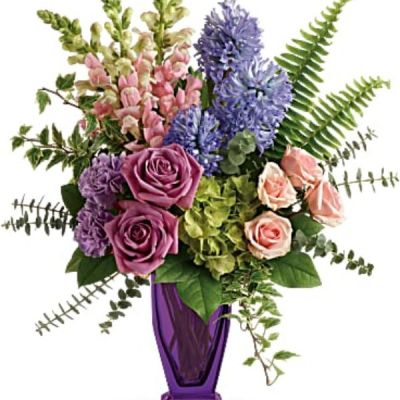 <div class="m-pdp-tabs-description">
<div id="mark-1" class="m-pdp-tabs-marketing-description">

<hr />

Arranged in a stunning violet couture vase, this impressionist-inspired bouquet of hydrangea, roses and hyacinth brings sophisticated spring style to any occasion.

</div>
</div>
<p id="arrngDescp">Green hydrangea, lavender roses, pink spray roses, lavender carnations, pink snapdragons and lavender hyacinth are arranged with sword fern, variegated ivy, spiral eucalyptus, and lemon leaf. Delivered in a Violet Couture Vase.</p>